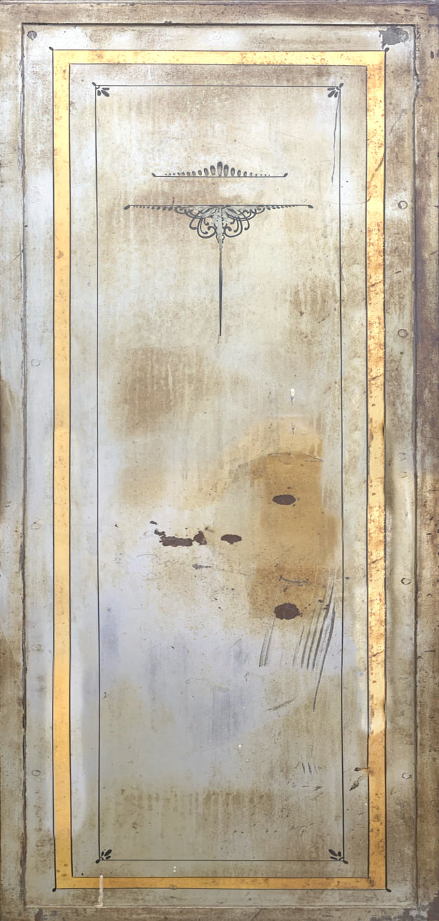 Decorative wall panel with gold frame and abstract design on a textured background