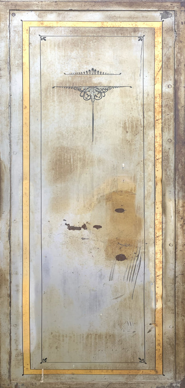 Decorative wall panel with gold frame and abstract design on a textured background