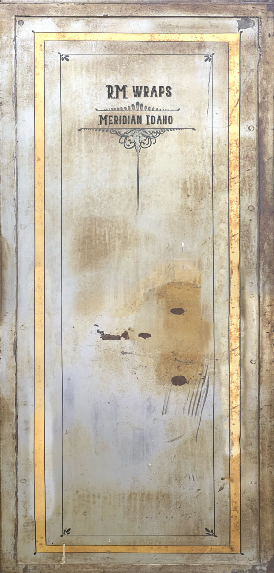 Product packaging with 'RM Wraps' branding on a textured background