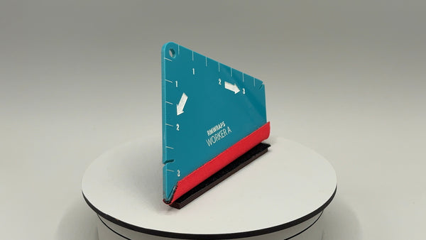 Blue and red tool on a white platform with a gray background