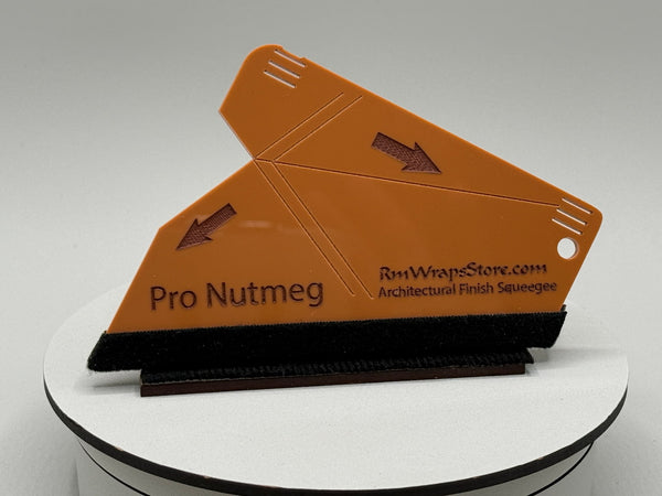 Pro Nutmeg architectural finish squeegee on a white platform with a gray background