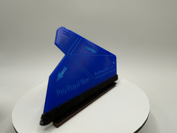 Blue squeegee on a white stand with a gray background
