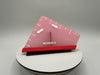 Red and white triangular ruler with 'WORKER A' label on a gray background