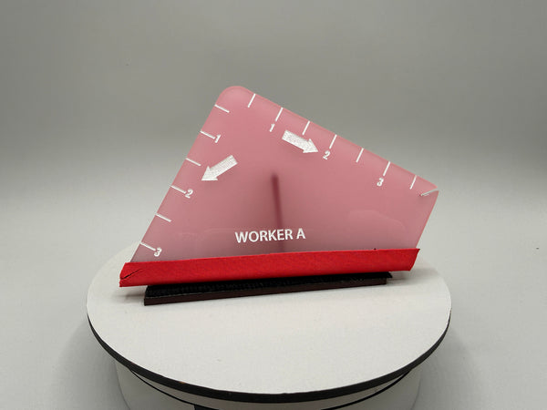 Red and white triangular ruler with 'WORKER A' label on a gray background