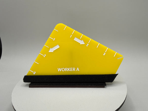 Yellow triangular tool with 'WORKER A' branding on a gray background