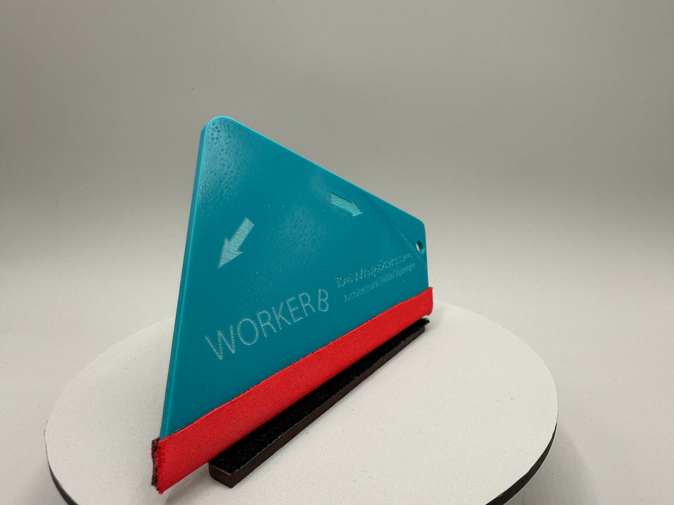 Triangular tool with 'WORKER8' branding on a gray background