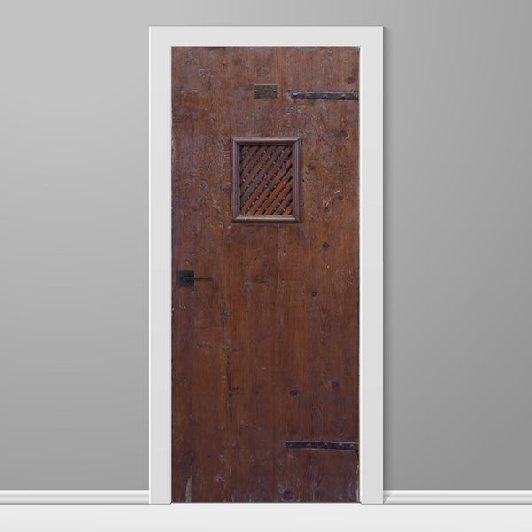 Wooden door with a lattice design on a gray background
