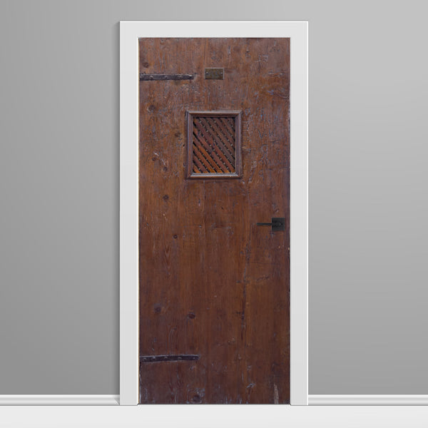 Wooden door with a lattice design on a gray background