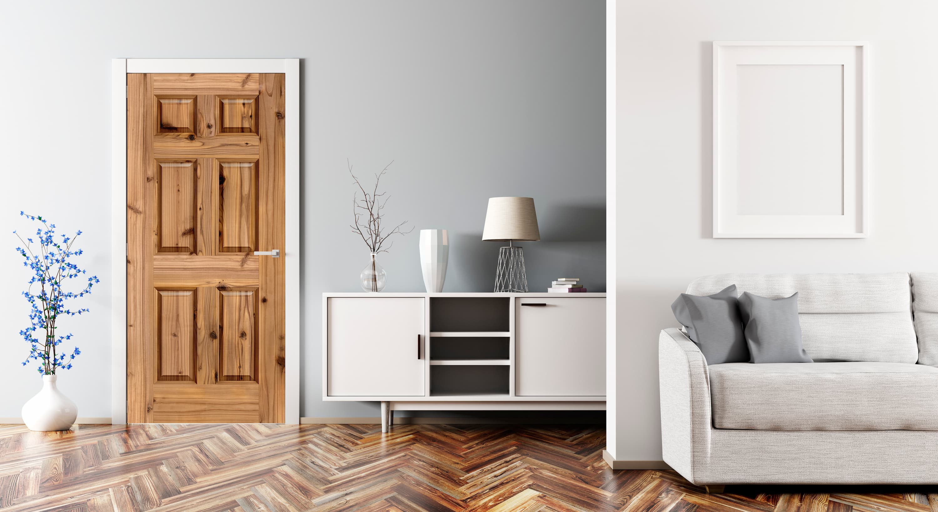 Modern living room with wooden door, white cabinet, and gray sofa.