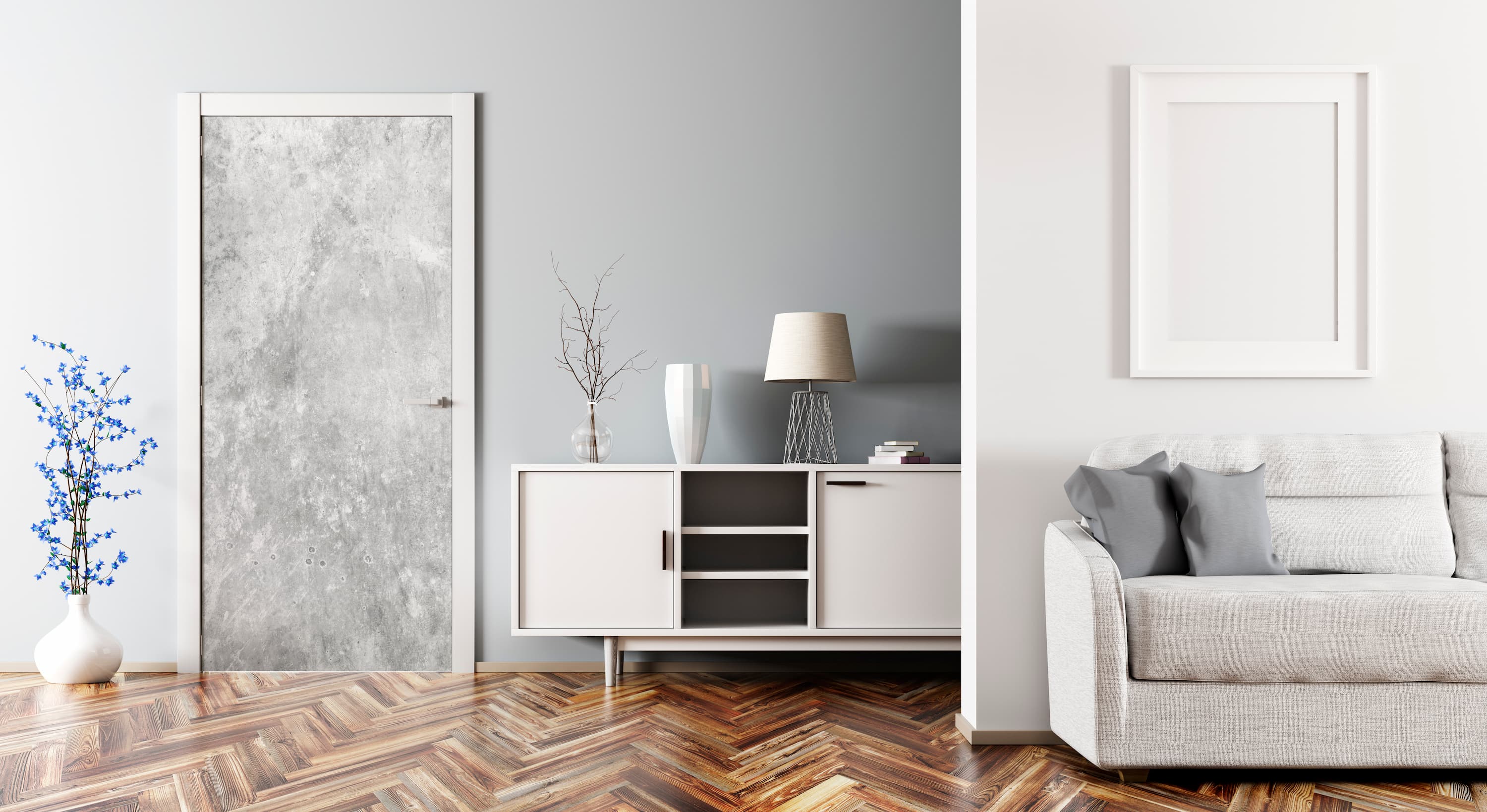 Modern living room with gray sofa, white sideboard, and framed artwork on a gray wall.