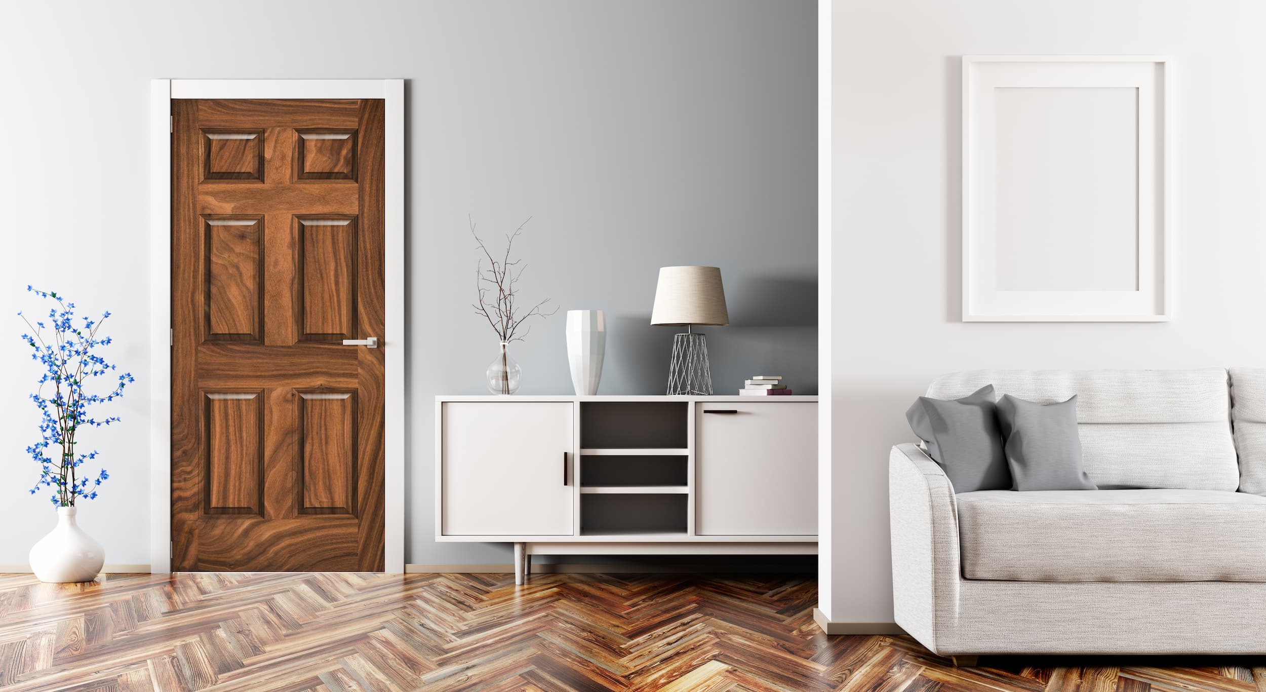 Modern living room with wooden door, white cabinet, and gray sofa.