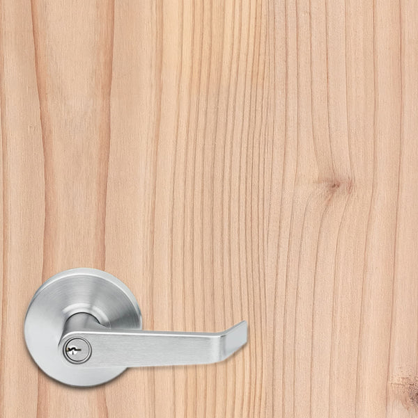 Metal door handle on a wooden door