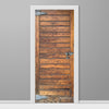 Wooden door with metal handles on a gray wall