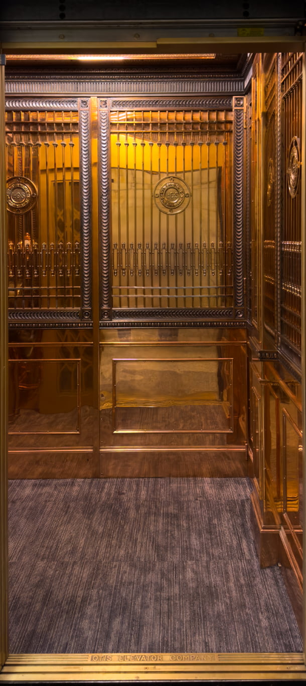 Golden Elevator Cab Door Wrap