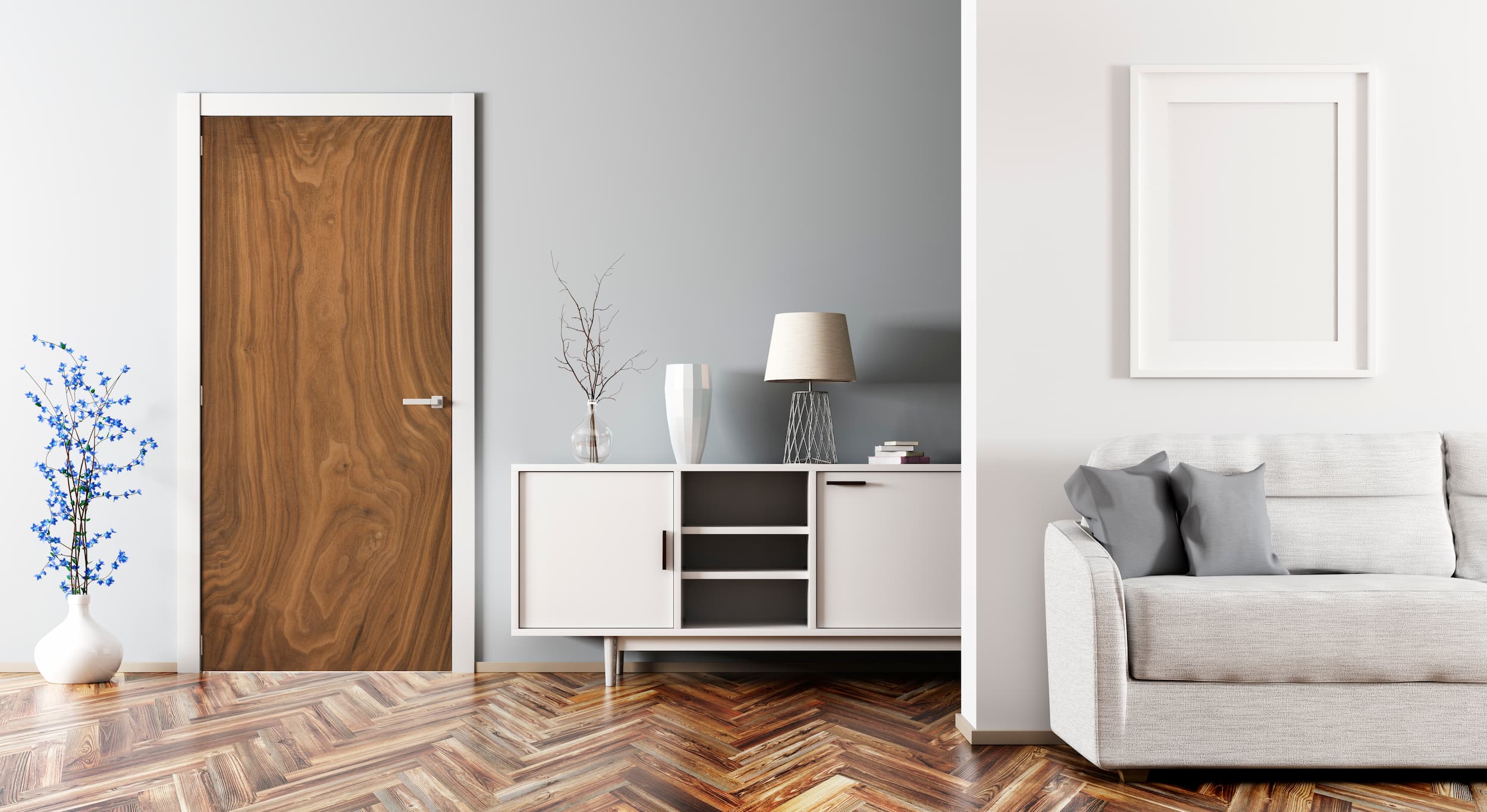 Modern living room with wooden door, white cabinet, and gray sofa.