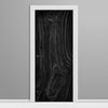Wooden door with black wood grain pattern on a gray wall