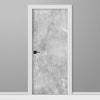Door with gray textured panel and white frame on a gray background